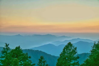 Kentenfromlucca 2 album cover featuring a serene landscape with soft blues and greens.