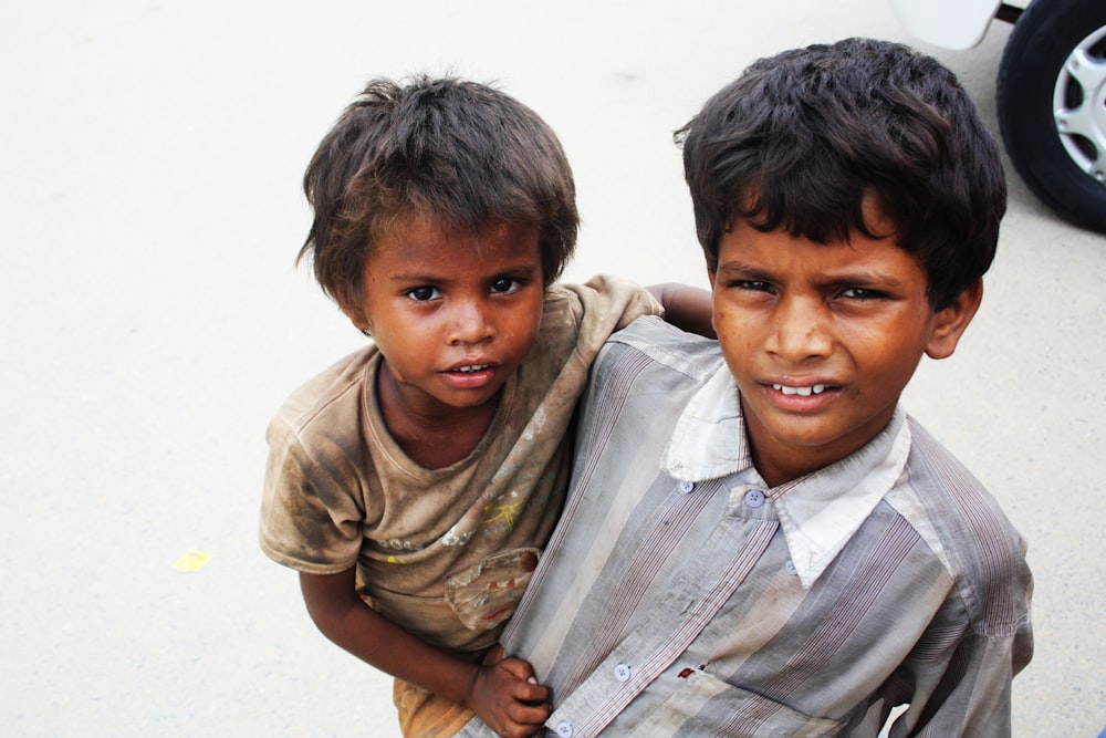 boy carrying boy