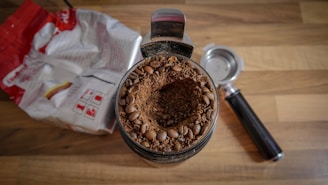 coffee beans beside white plastic pack
