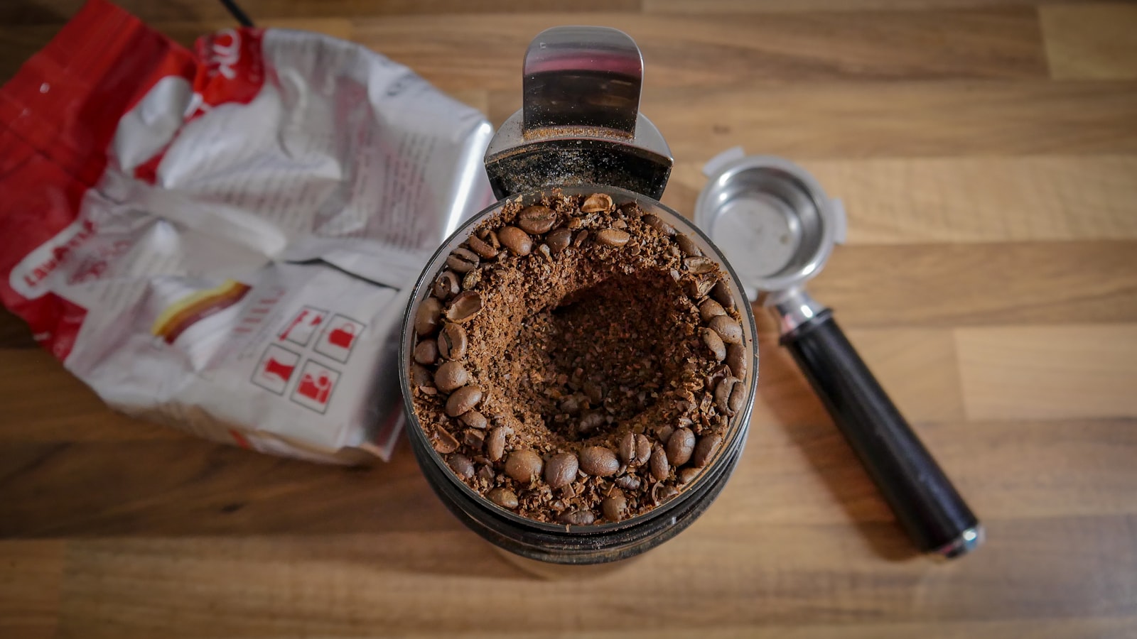 Panasonic Lumix G Vario 14-42mm F3.5-5.6 ASPH OIS sample photo. Coffee beans beside white photography