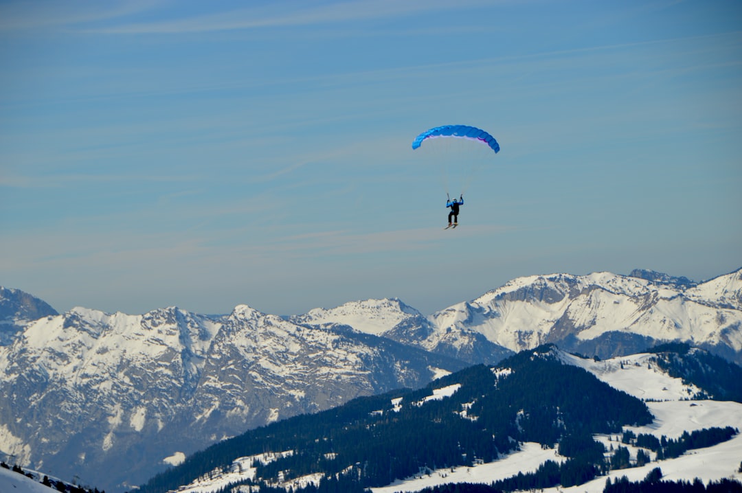 Whilst skiing this paraglider launched from the piste next to me. Luckily I had my camera in a back pack and after some fumbling was able to share his vista gliding down into the valley. Really pleased to catch a moment with better contrast whilst he was framed against the sky rather than the darker forest