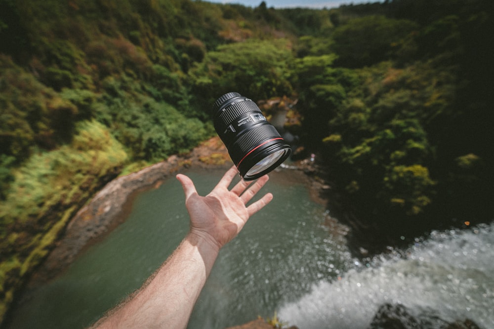 person about to catch lens