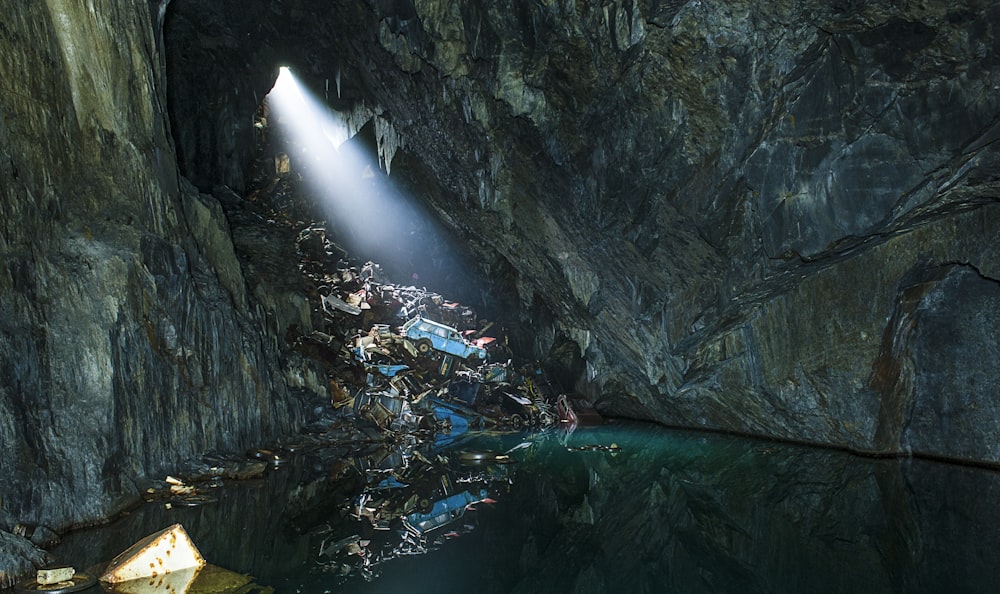 photo of body of water in cave