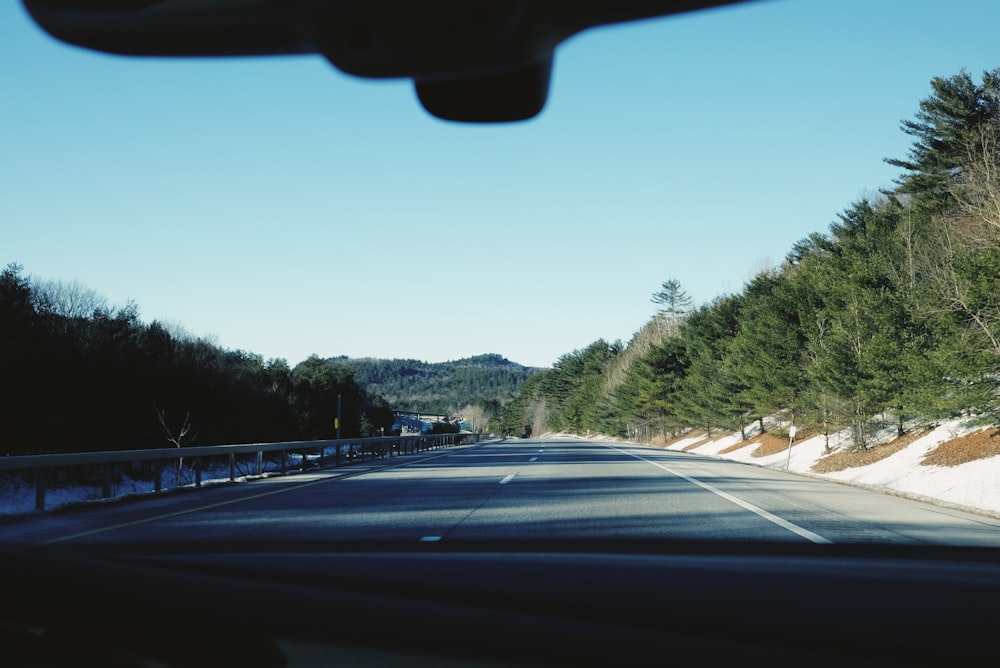 grey road on car front view