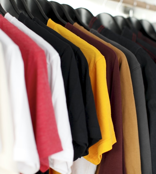 closeup of hanged shirts on rack