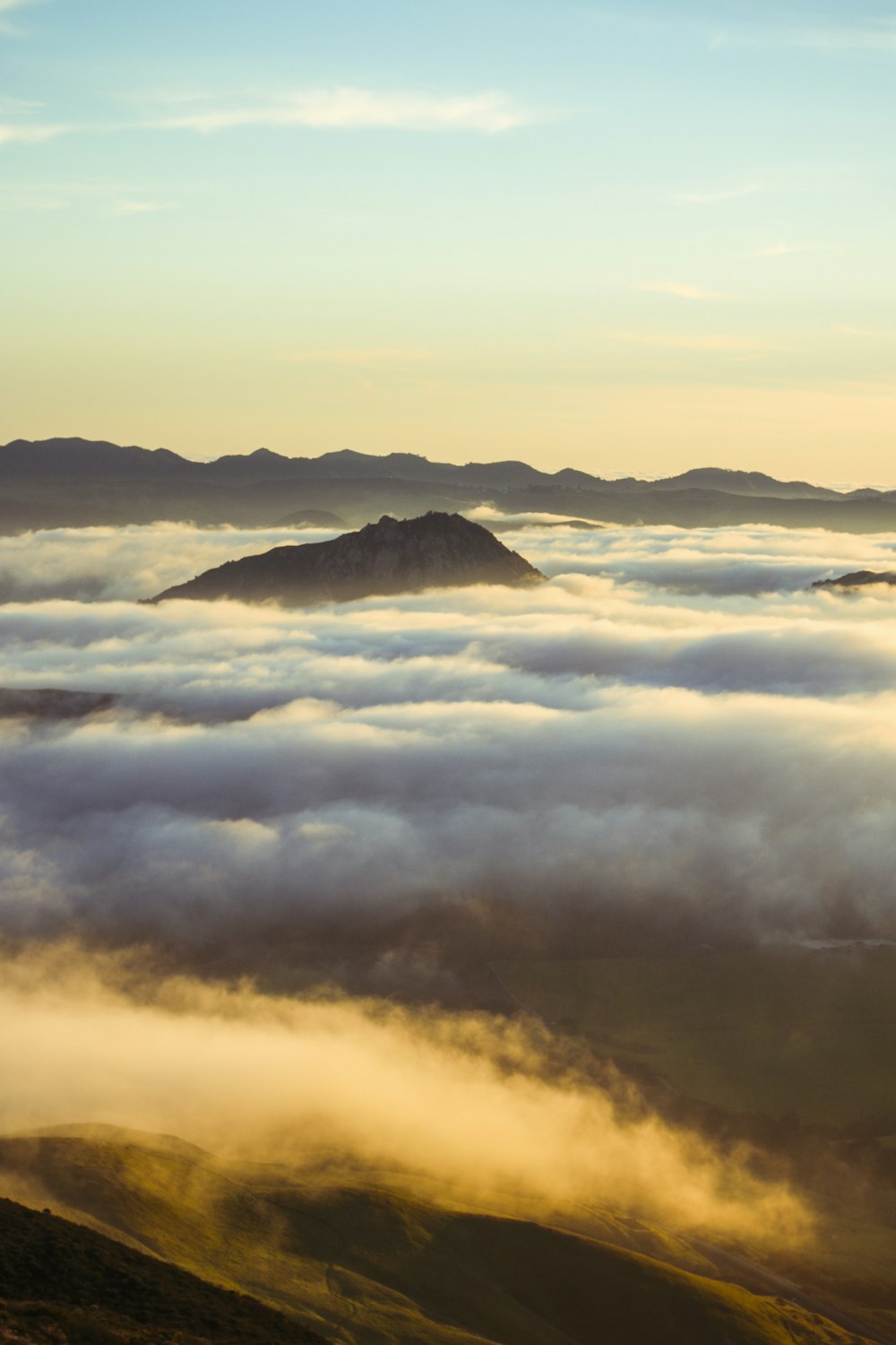 photo of clouds and mountains