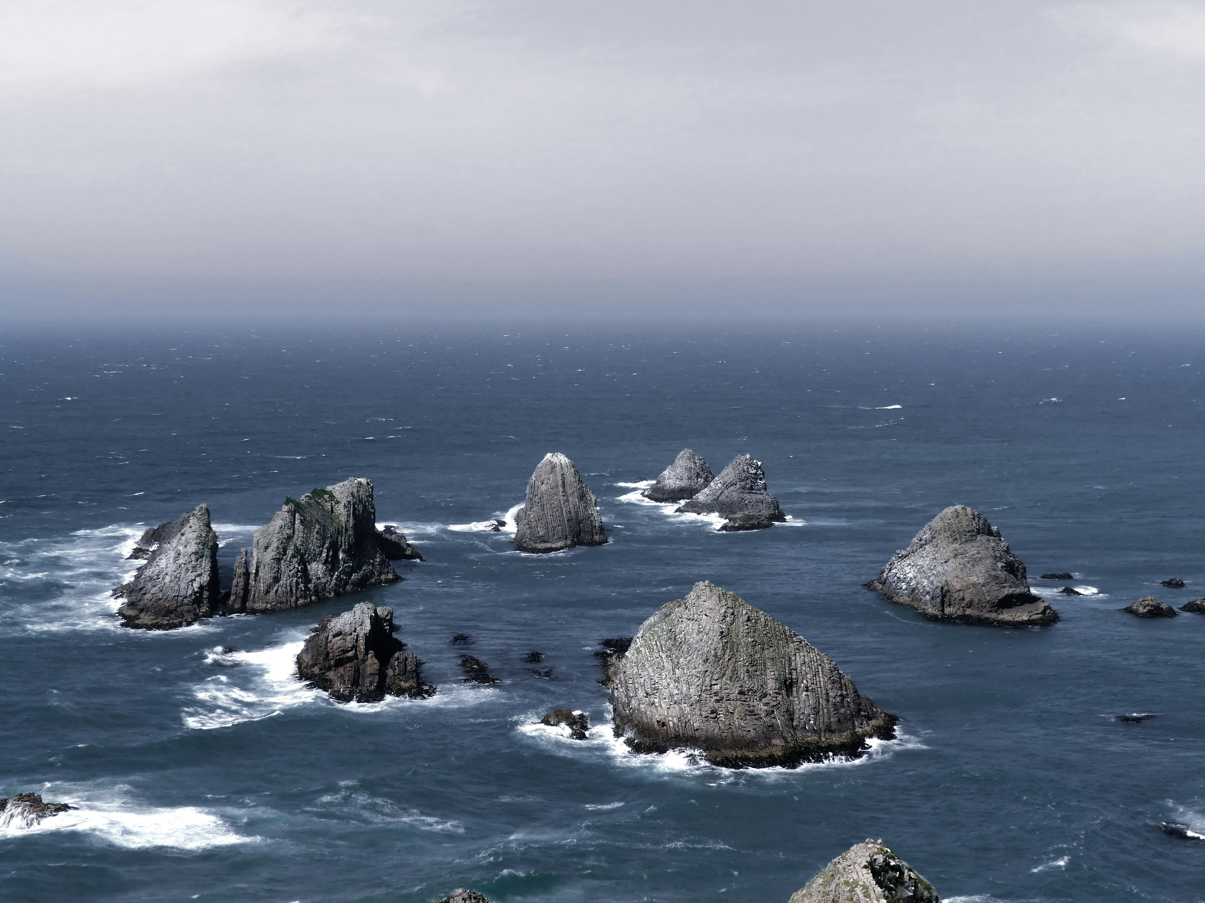 photo of islets surrounded by body of water