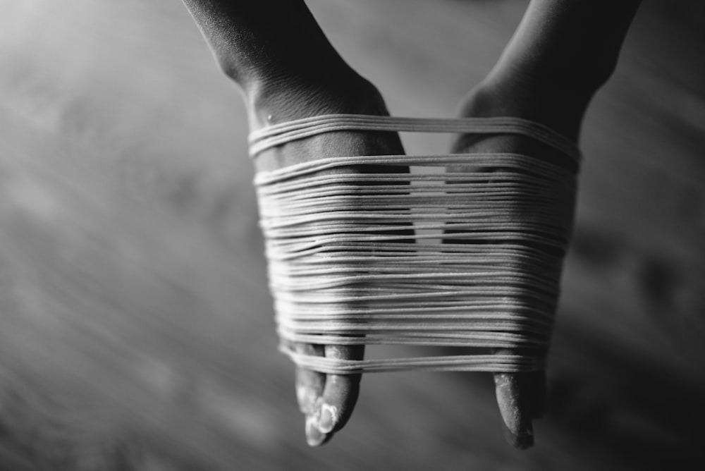 person making noodles