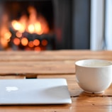 A cozy scene of someone sharing a heartfelt message on their laptop.