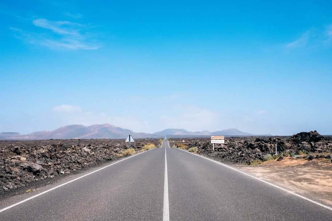 grey concrete road during daytime