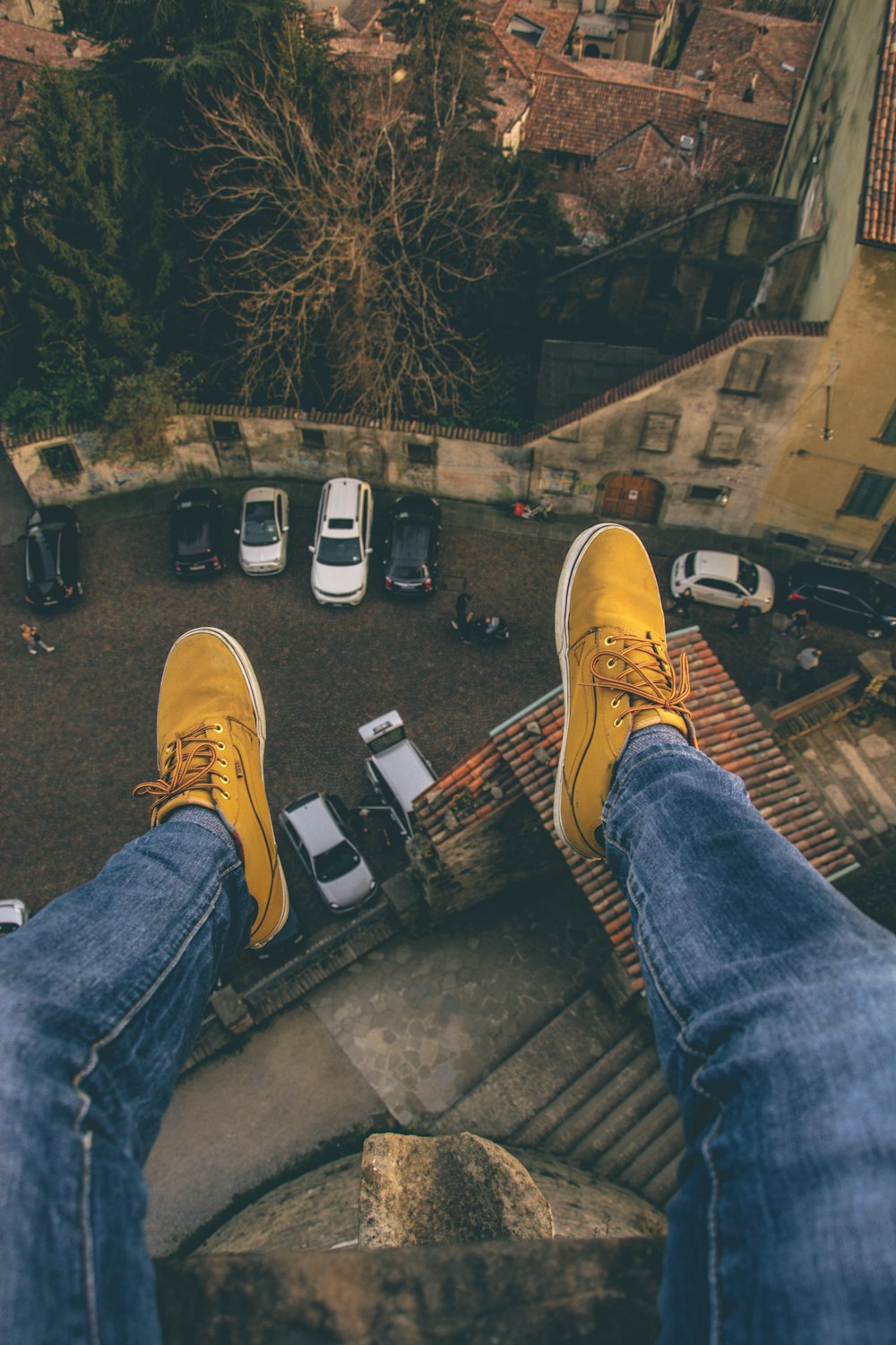 person sitting on rooftop