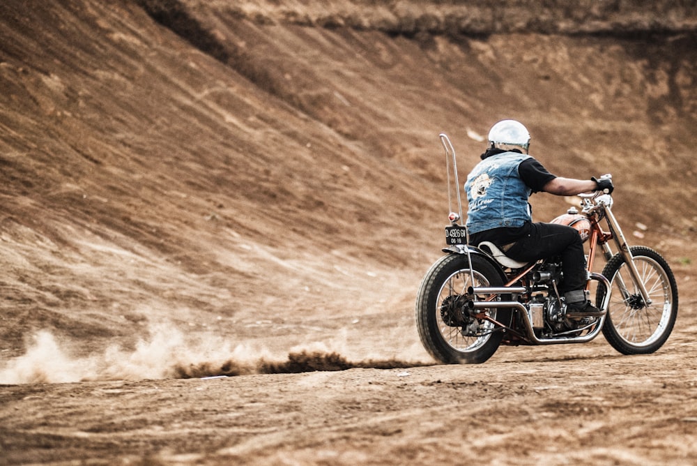 man riding on motorcycle during daytime