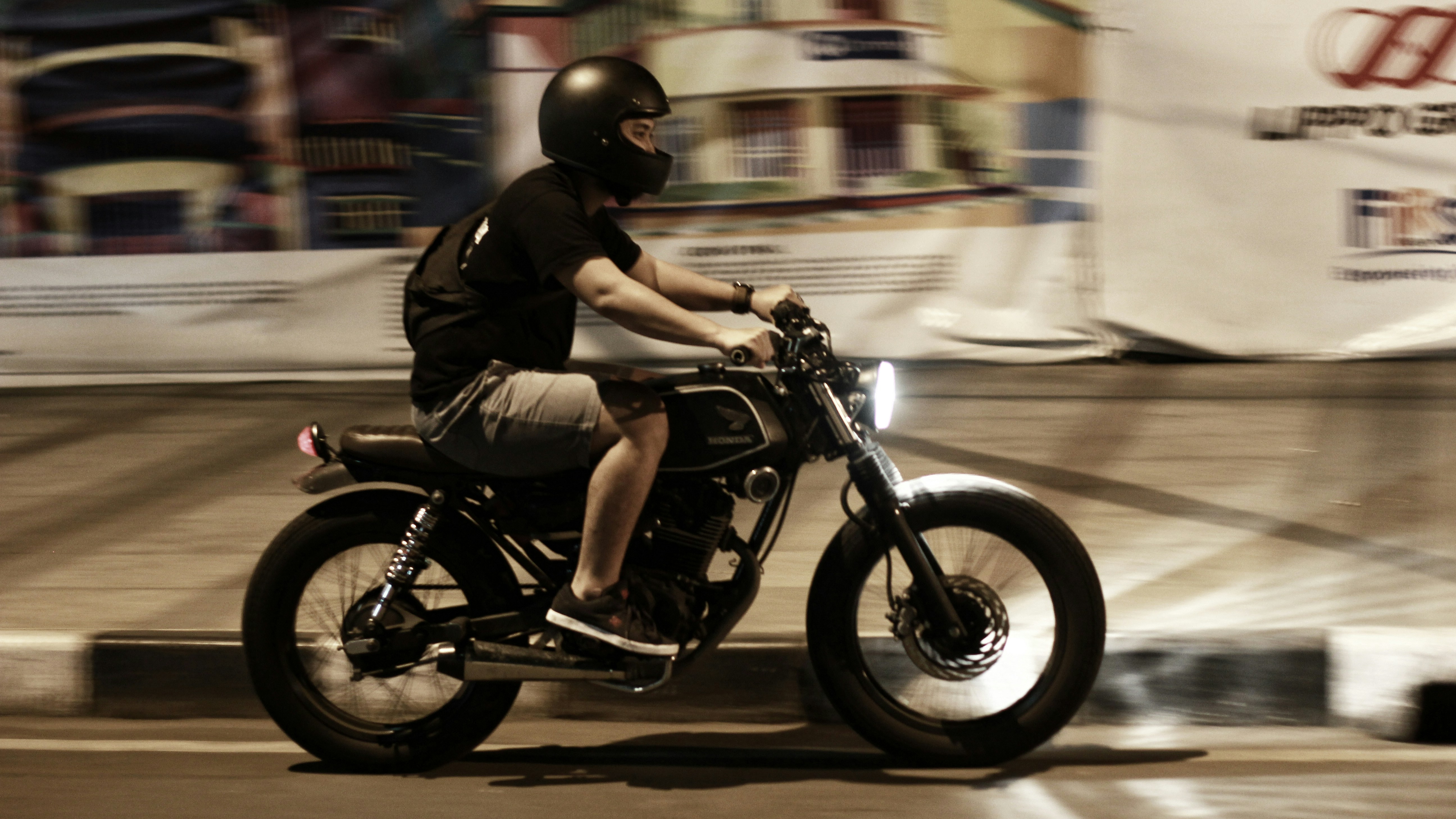 Riding a motorbike in the evening