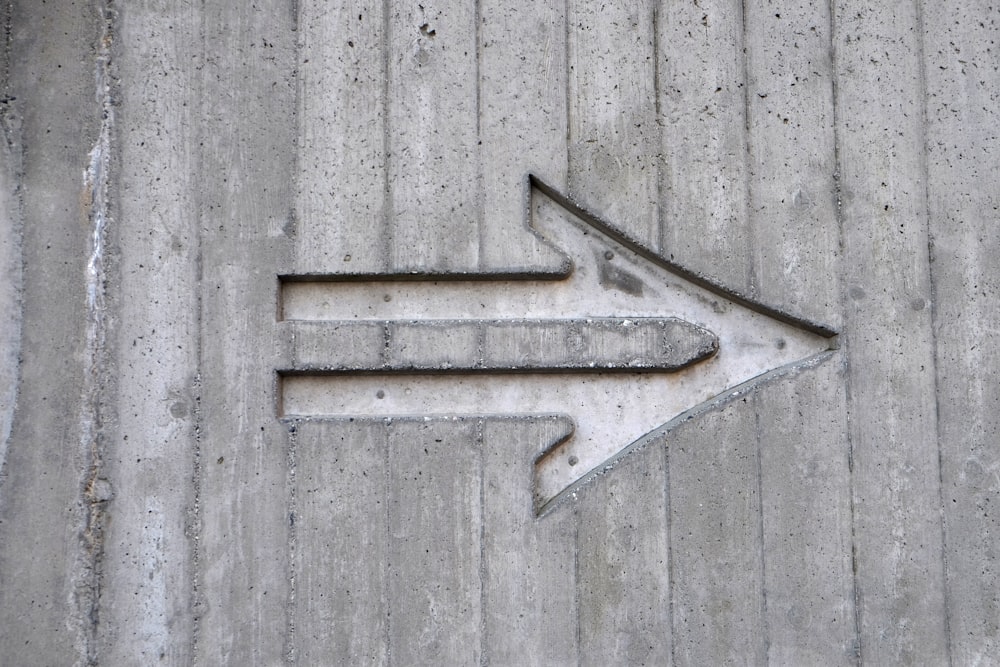gray arrow left sign