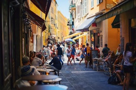people on alleyway during daytime