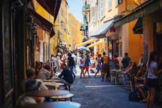 people on alleyway during daytime