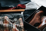 pair of brown leather dress shoes with box