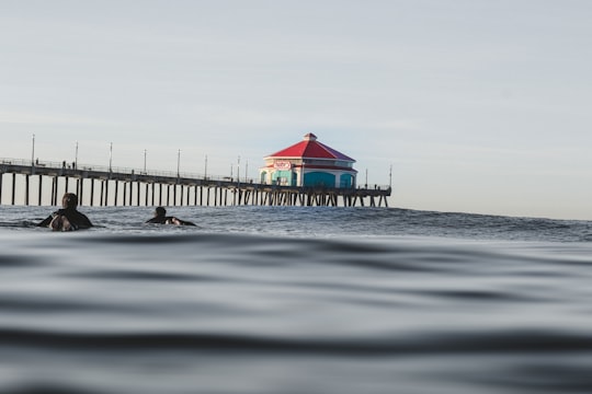 red and blue house near dock in Huntington Beach United States