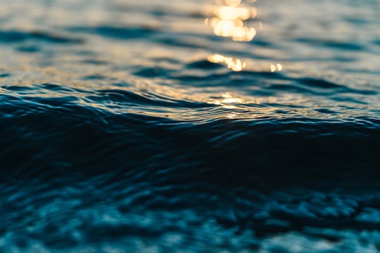 close-up photography of sunlight reflection on body of water in Cherepovets Russia