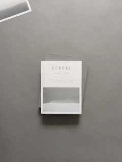 A sleek, minimalistic academic journal cover featuring deep green and navy blue tones with crisp typography.