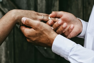 man holding person's hands