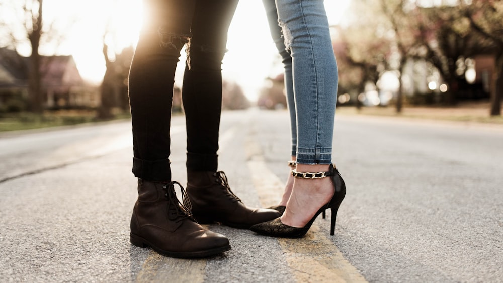 worm's eye view photography of man and woman facing each other