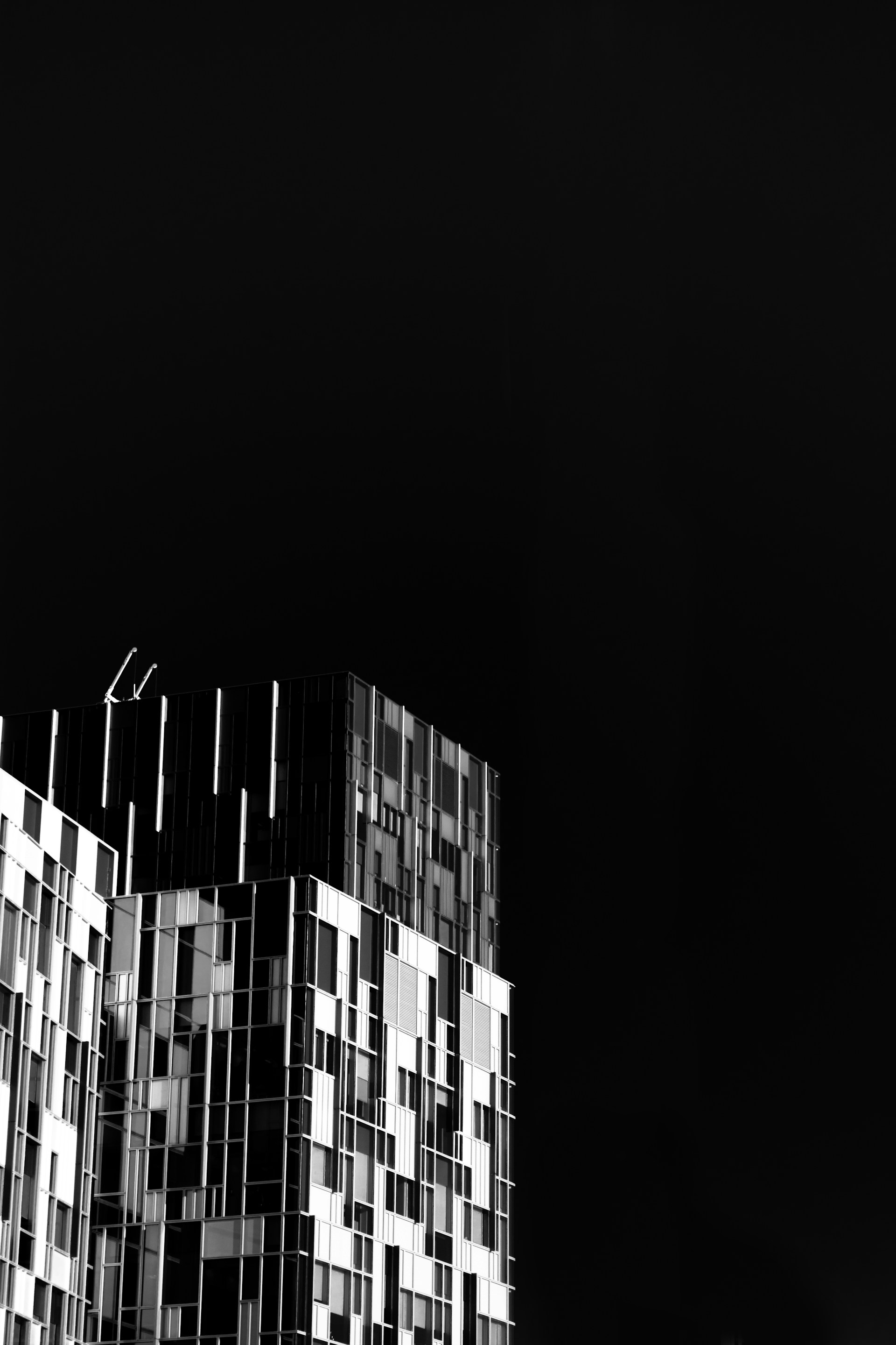 a black and white photo of a tall building