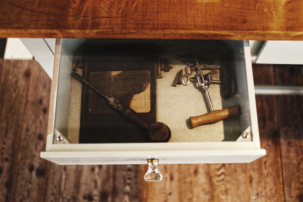 opened white wooden drawer