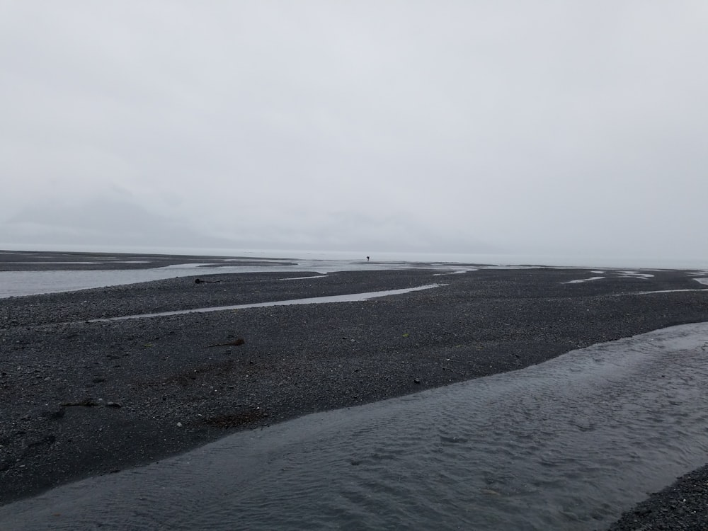 gray concrete road under gray sky