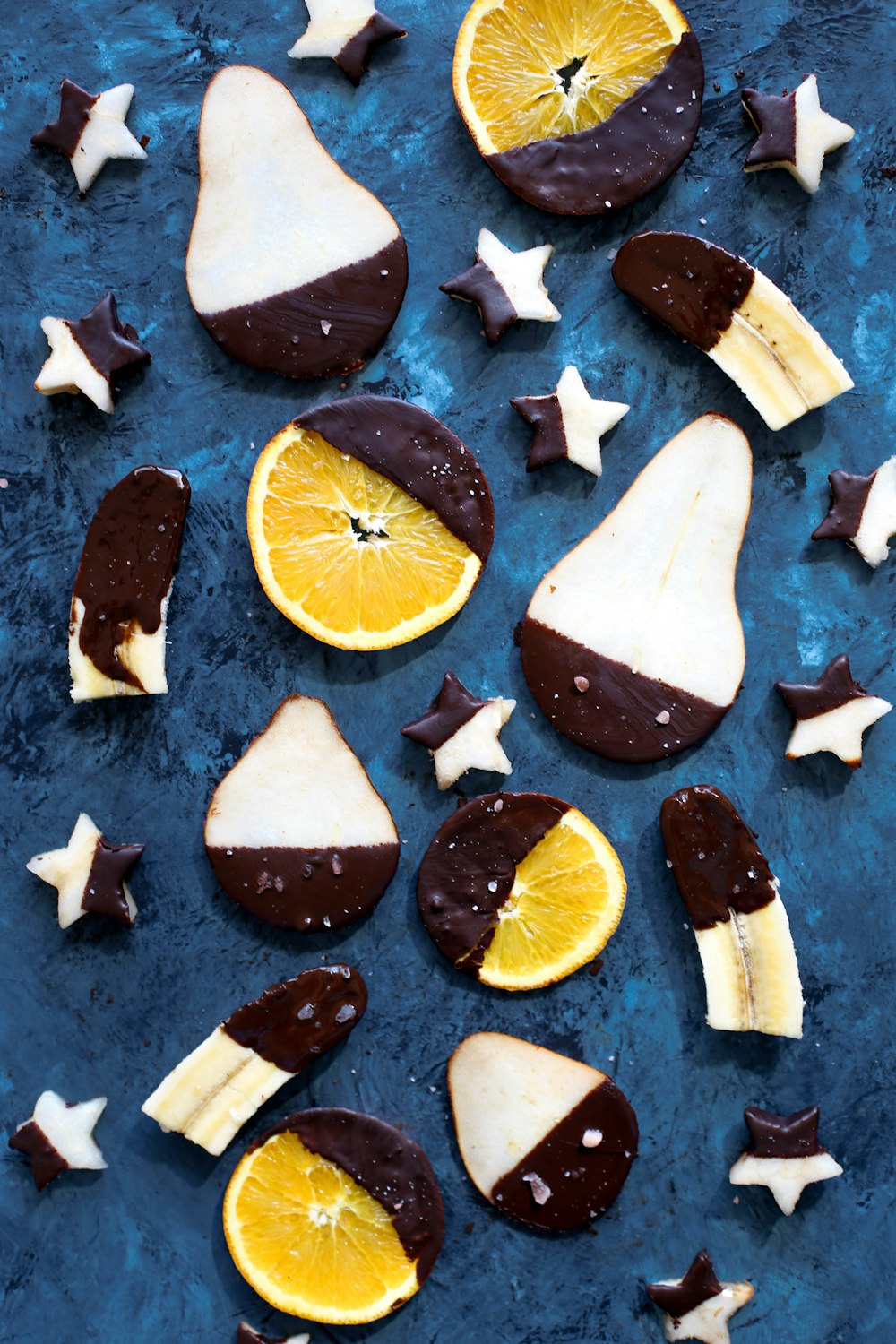 sliced fruits coated with chocolates