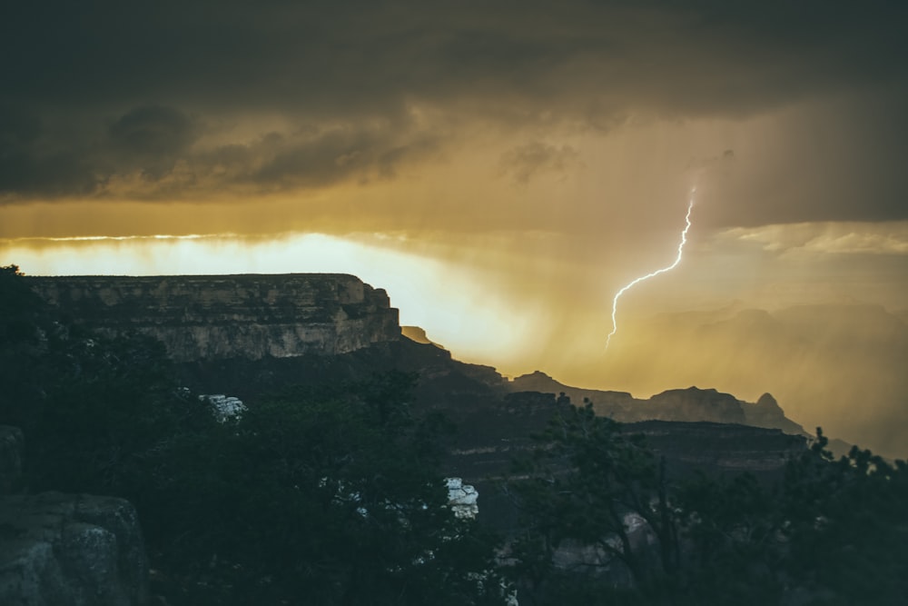 lighting strikes down in sandstorm