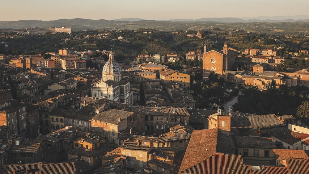 Beautiful aerial view by a drone of Siena, Italy. Charming old buildings showcase western Europe's architecture.