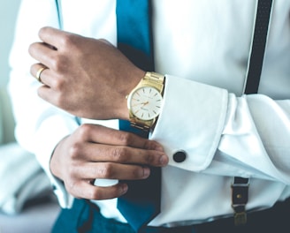 person wearing white dress shirt