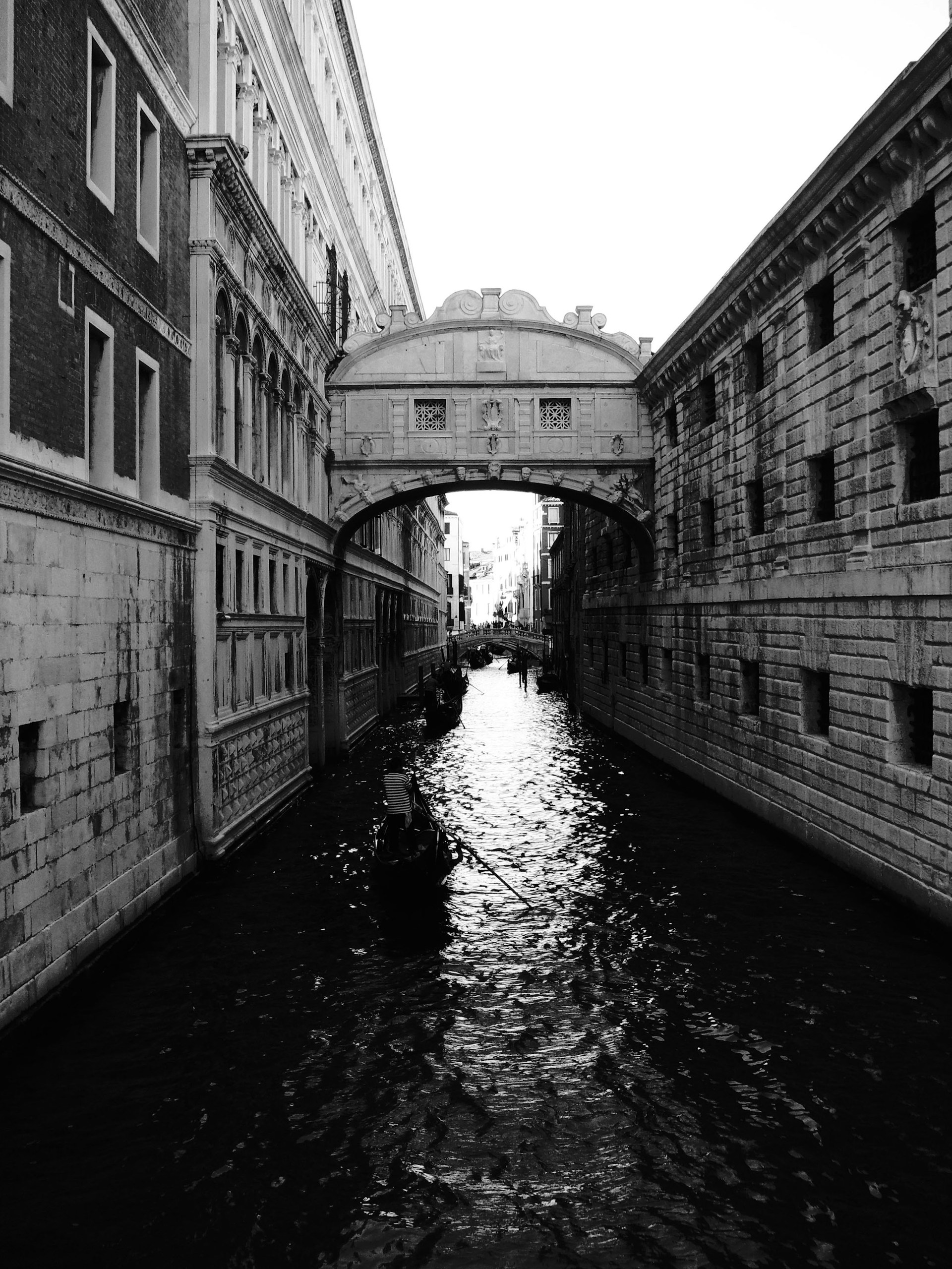 woman wearing yellow long-sleeved dress under white clouds and blue sky during daytime
