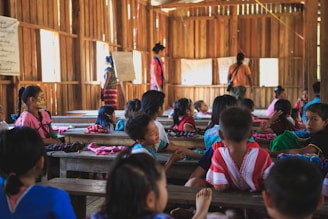 group of toddlers on the school with teacher teaching