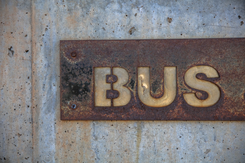 brown bus signage installed on wall