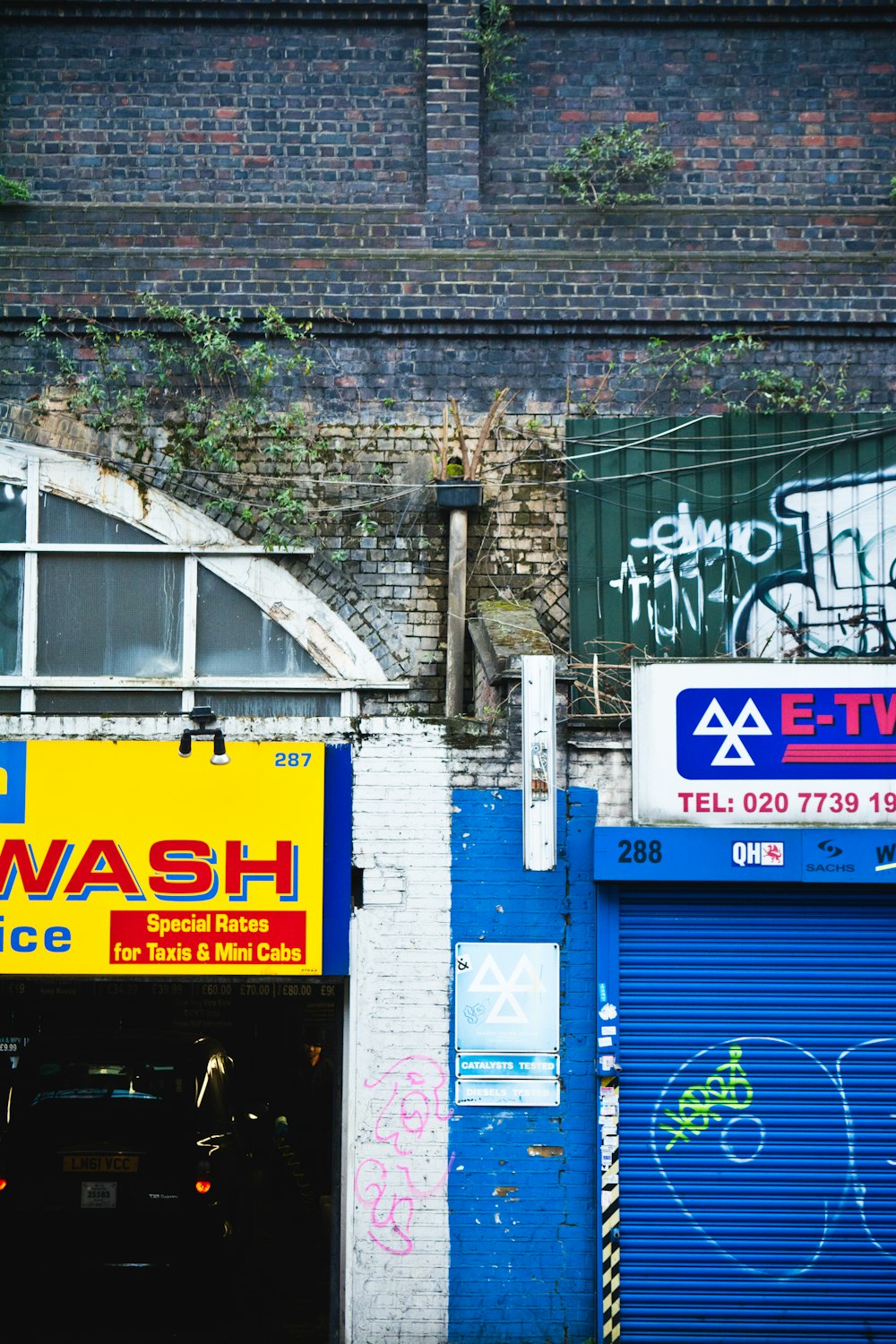 blue building door is close