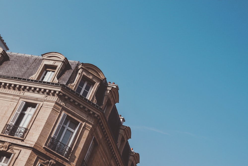 low angle photography of brown building during daytime