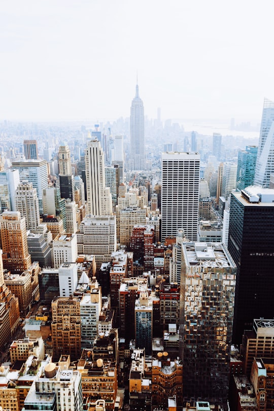 birds-eye view photo of city buildings with fog in New York City United States