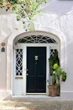 black wooden 6-panel door
