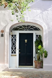 black wooden 6-panel door