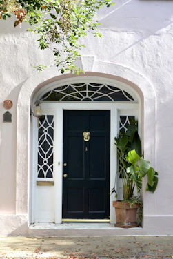 black wooden 6-panel door