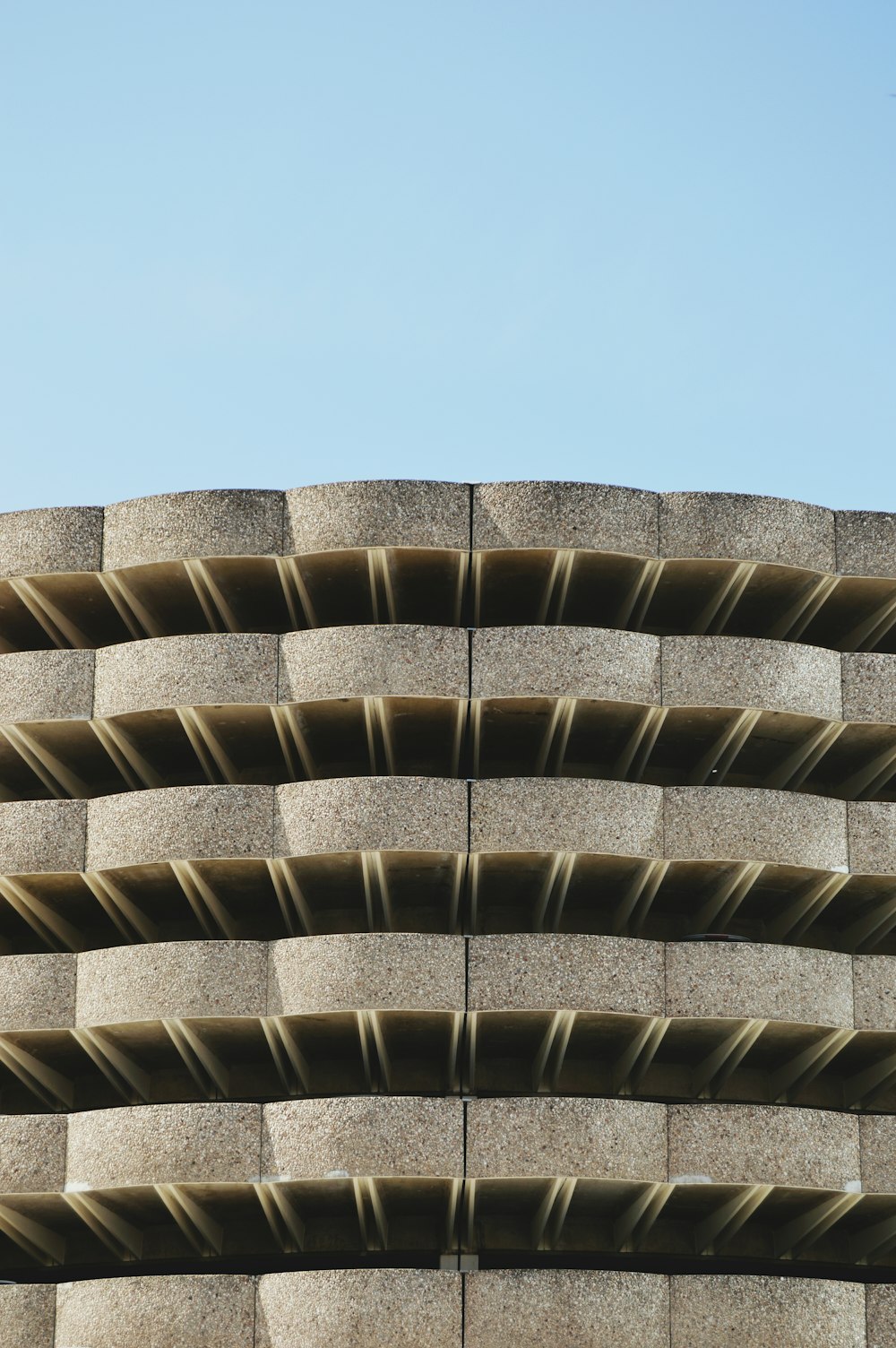 The concrete exterior of a multi-story parking lot