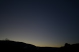 A serene landscape at dusk, symbolizing personal journeys.