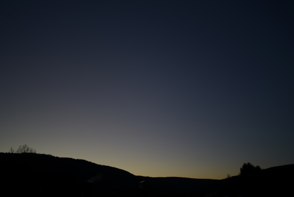 A serene landscape at dusk, symbolizing freedom and escape.