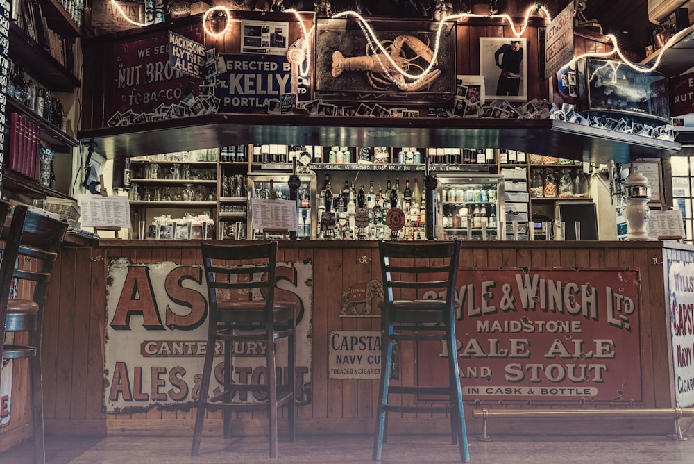 two bar chairs beside counter