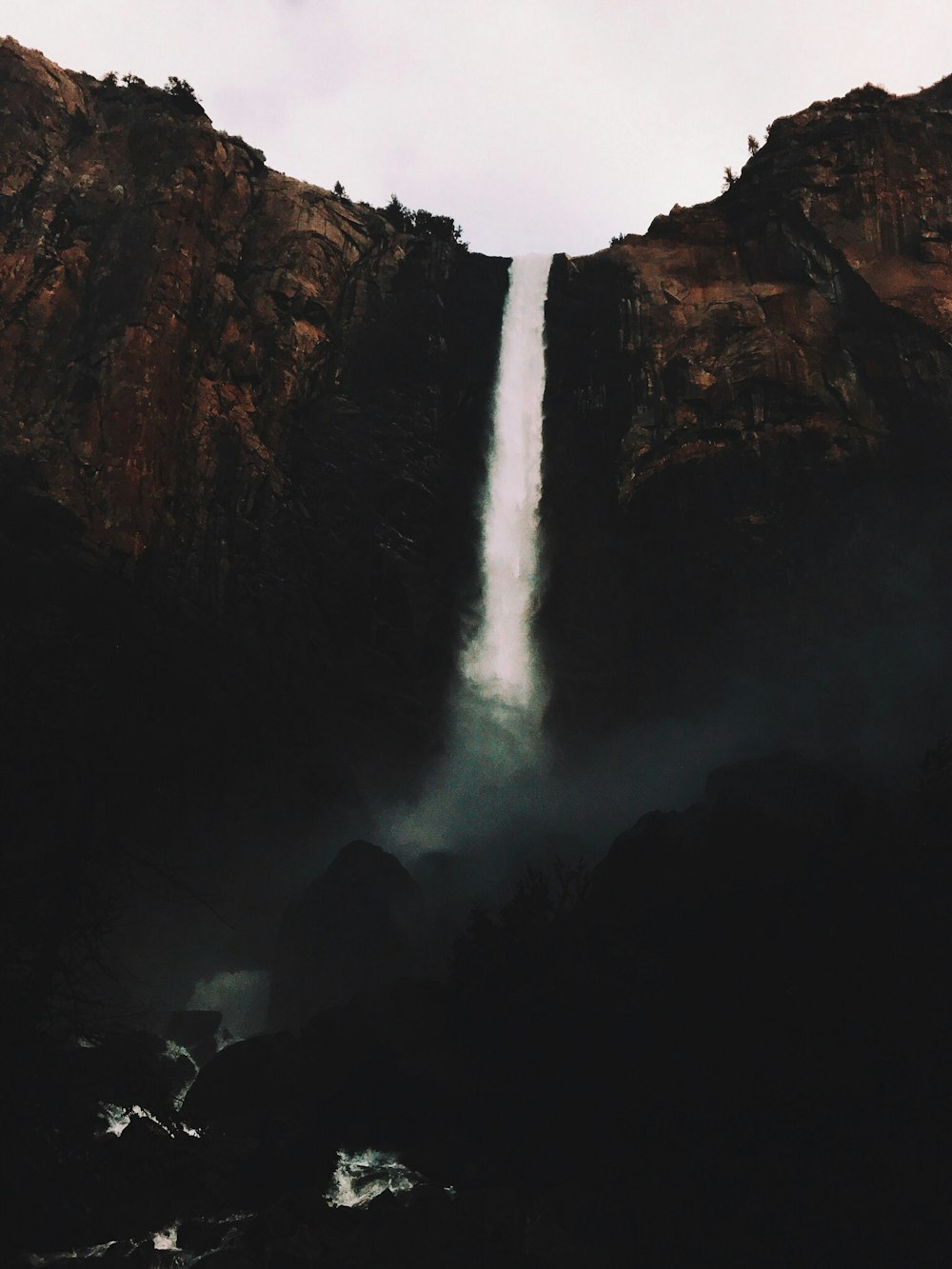 low-angle time-lapse photography of waterfall