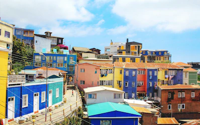 landscape photography of blue and yellow houses