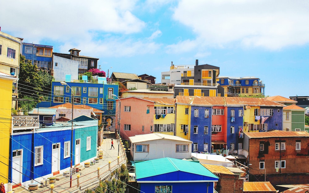 landscape photography of blue and yellow houses