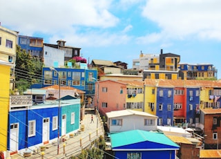 landscape photography of blue and yellow houses